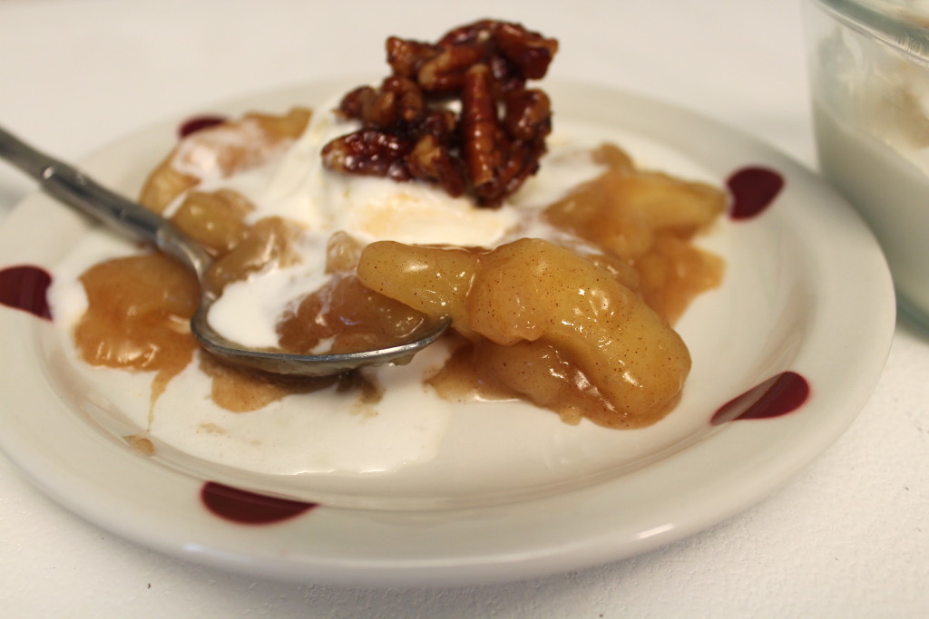 Warm cinnamon apples with vanilla ice cream melting into the fruit, topped with candied pecans for our dessert. Yummmmmmm.