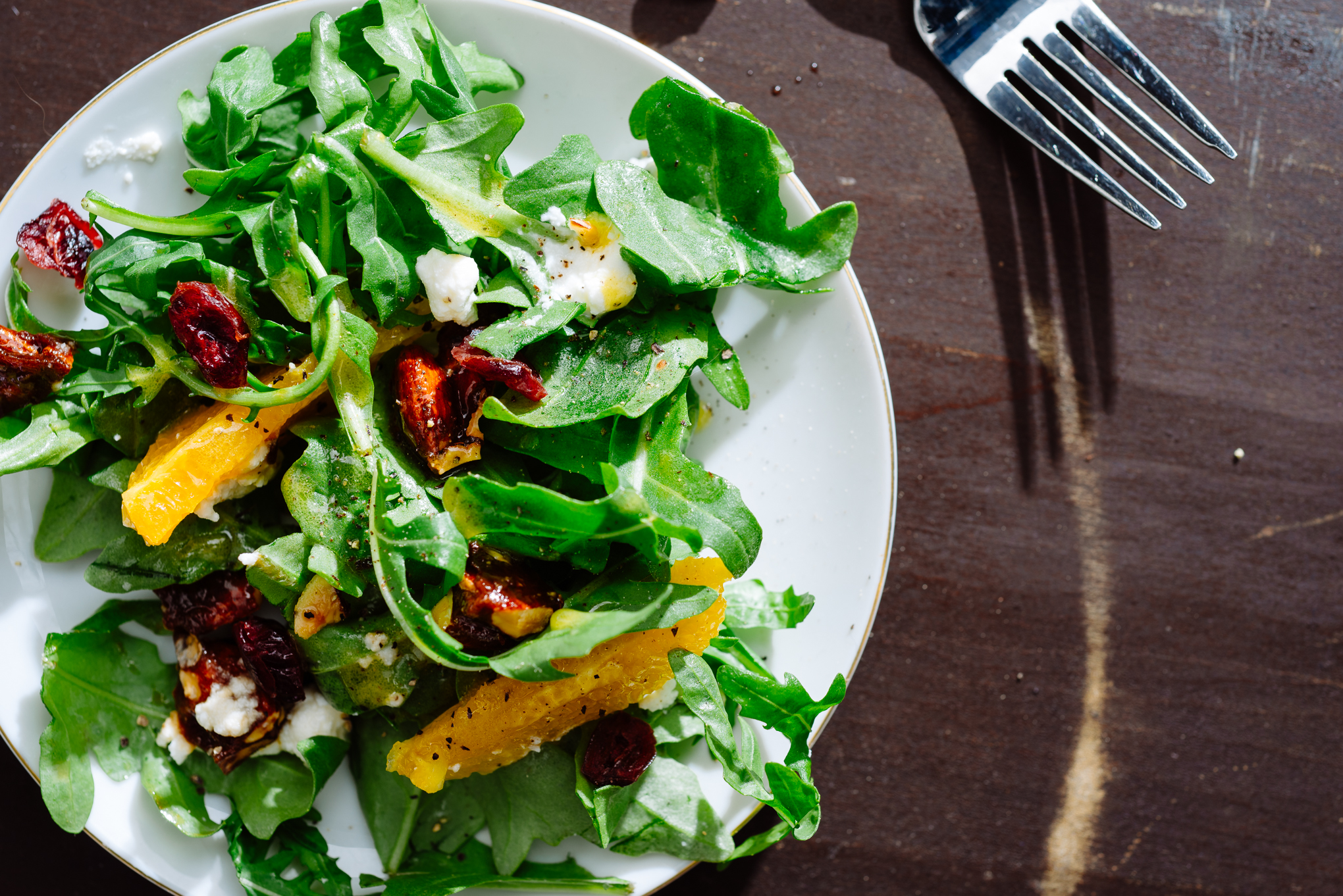 Arugula with Shallot Confit Vinaigrette and Toasted Almonds Recipe